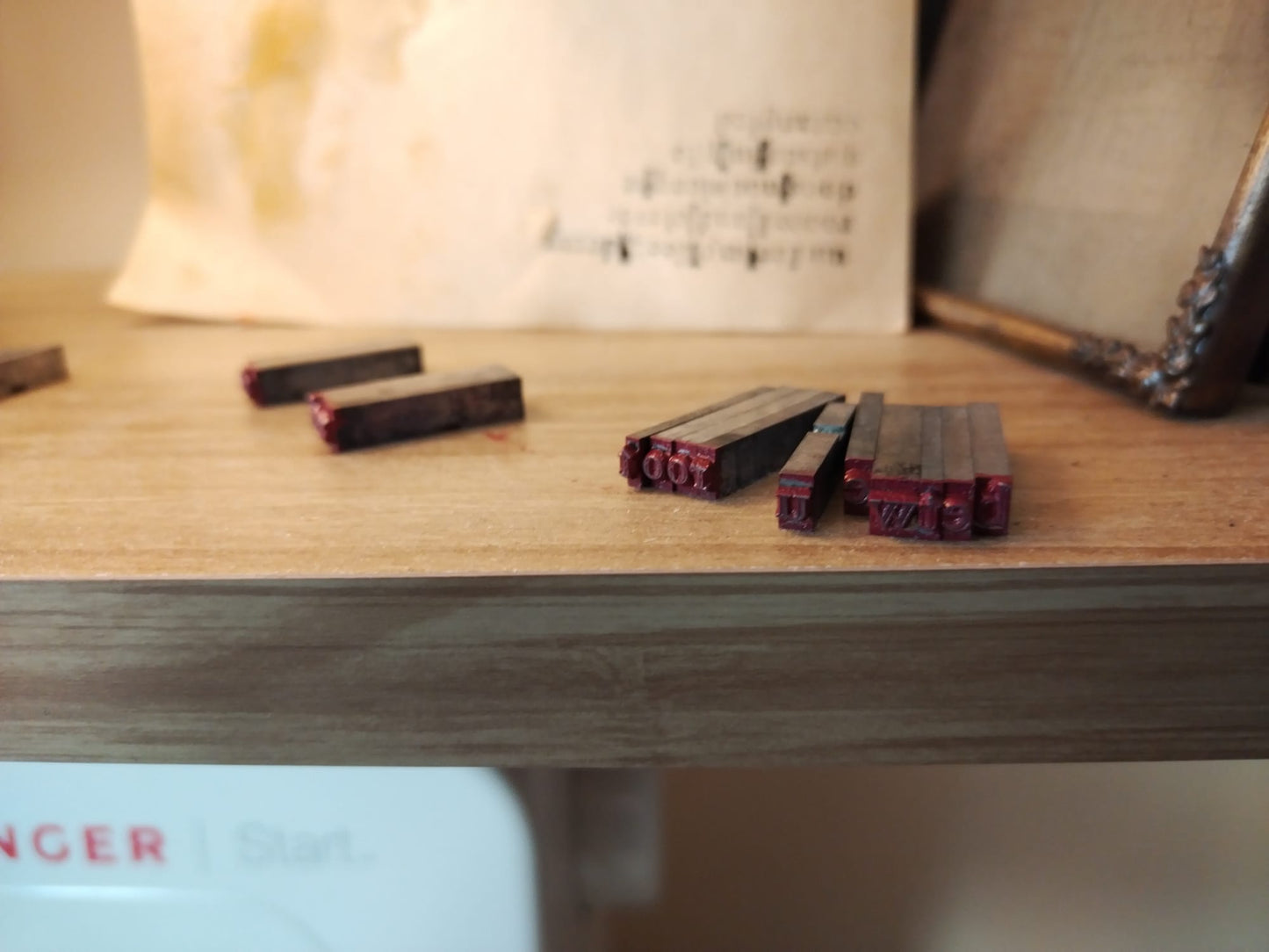 These are the vintage letterpress letters used to print the Meet Me at the Surface quote in ink on the reverse of this handmade printed bookmark from @analogish