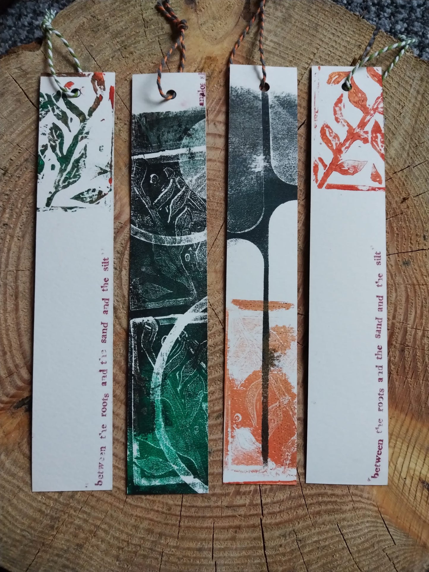 MMATS Handmade Bookmark from local artist is made with lino cutting printing and gelli plate printing as well as having a Meet Me At The Surface quote printed on the back.