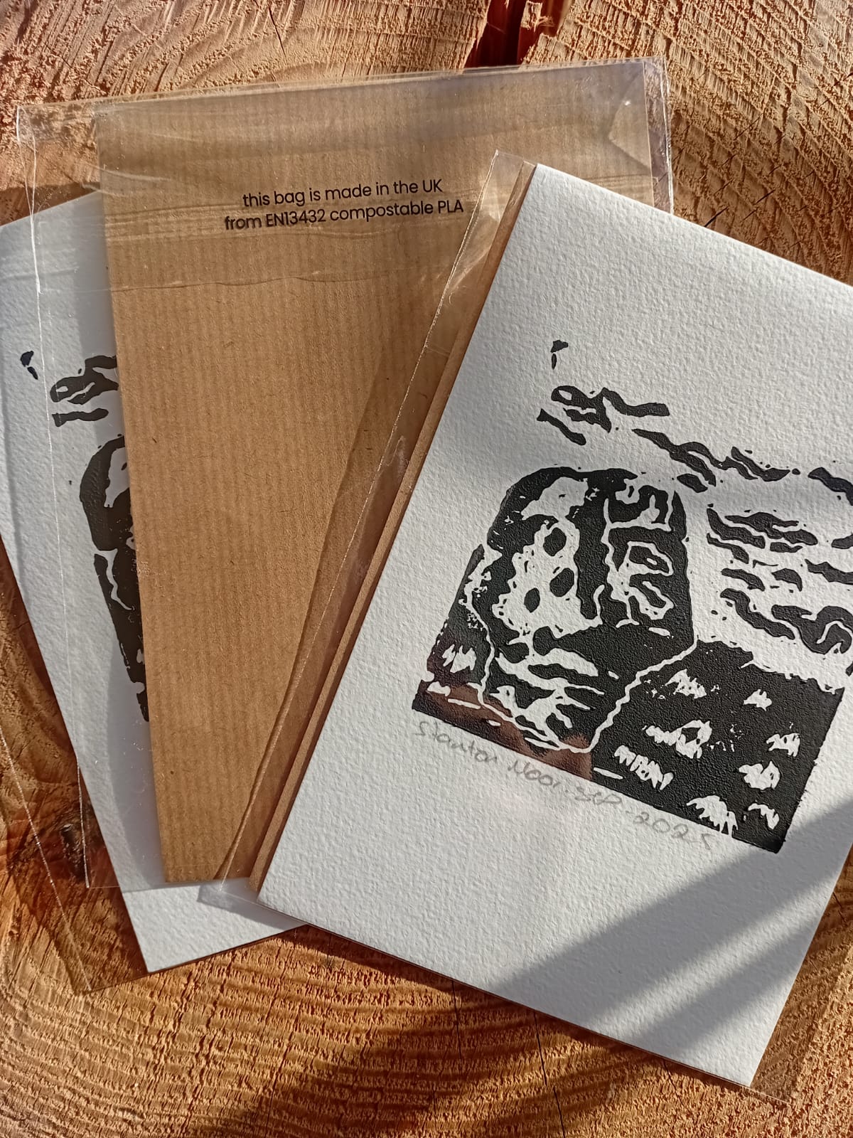 Stanton Moor and Andle Stone megalith black lino print from local print maker packaged in compostable plastic for an eco-friendly artwork