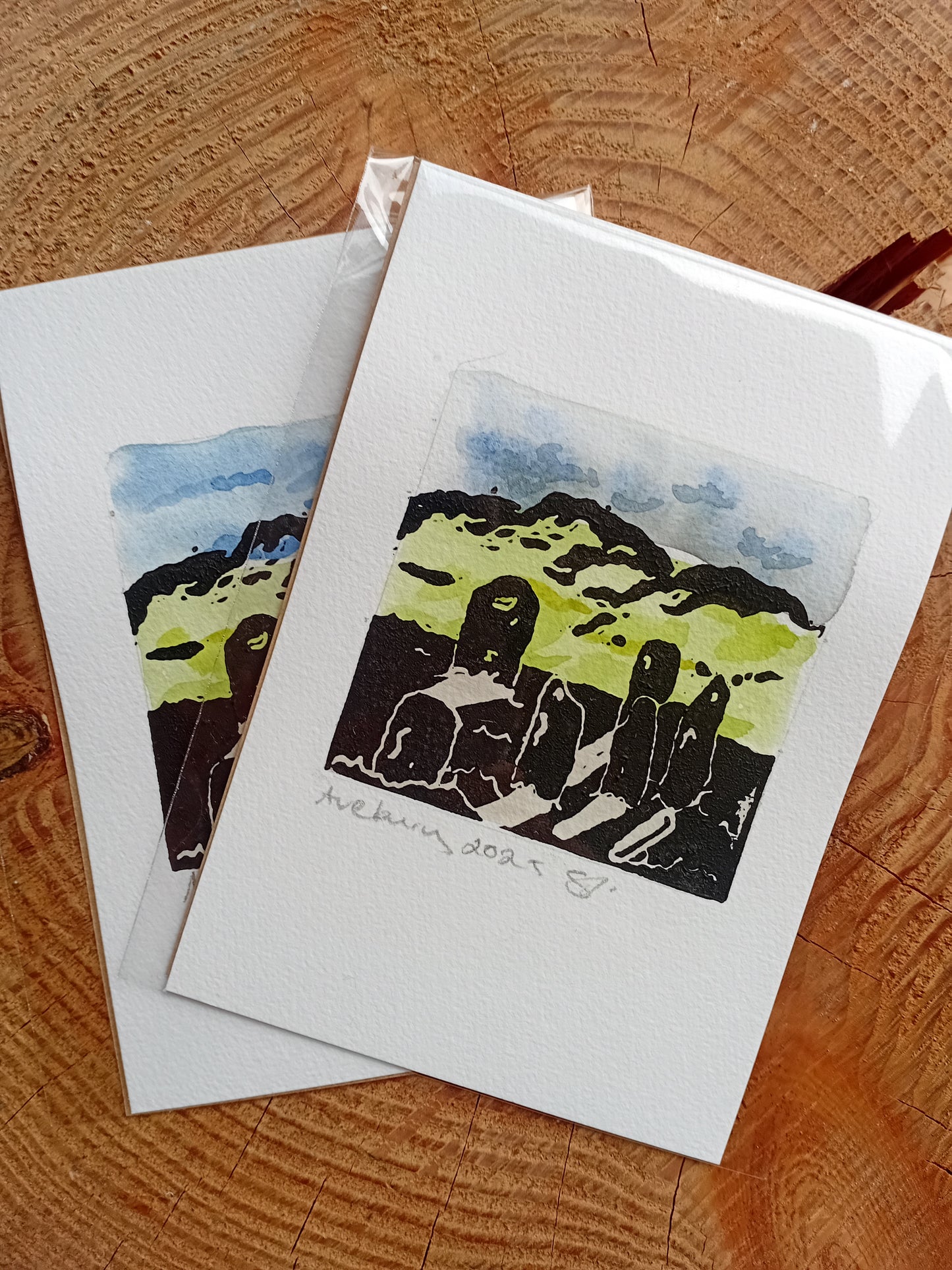 Two lino prints of the Avebury stone circle on watercolour paper