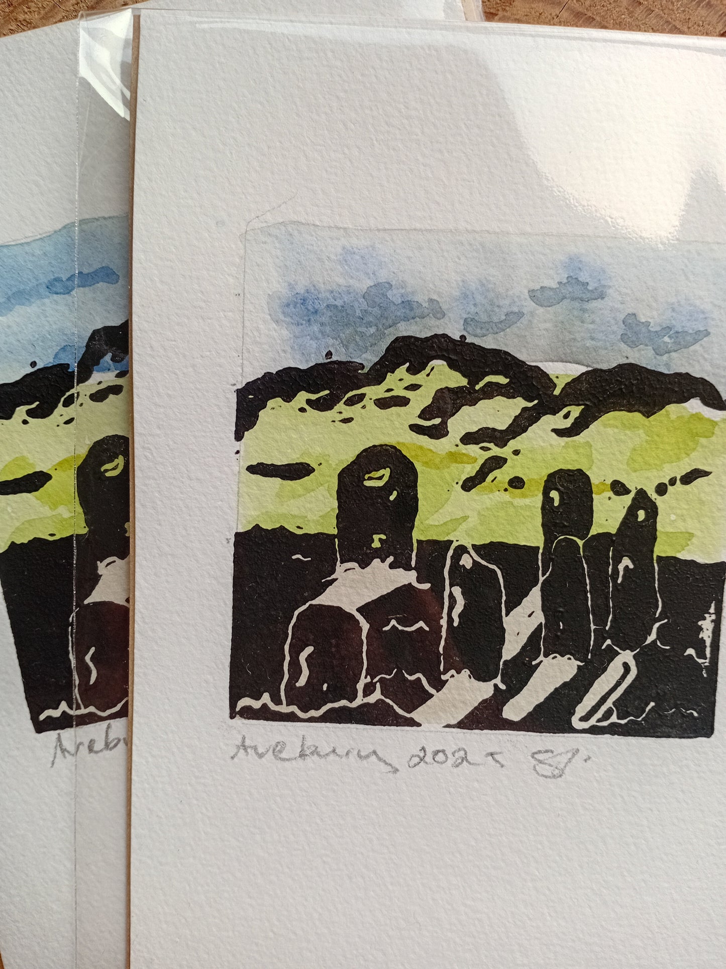 Image depicting the weather variation on Avebury Stone lino prints