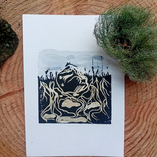 Video of the packaging of the Watchful Bones Print